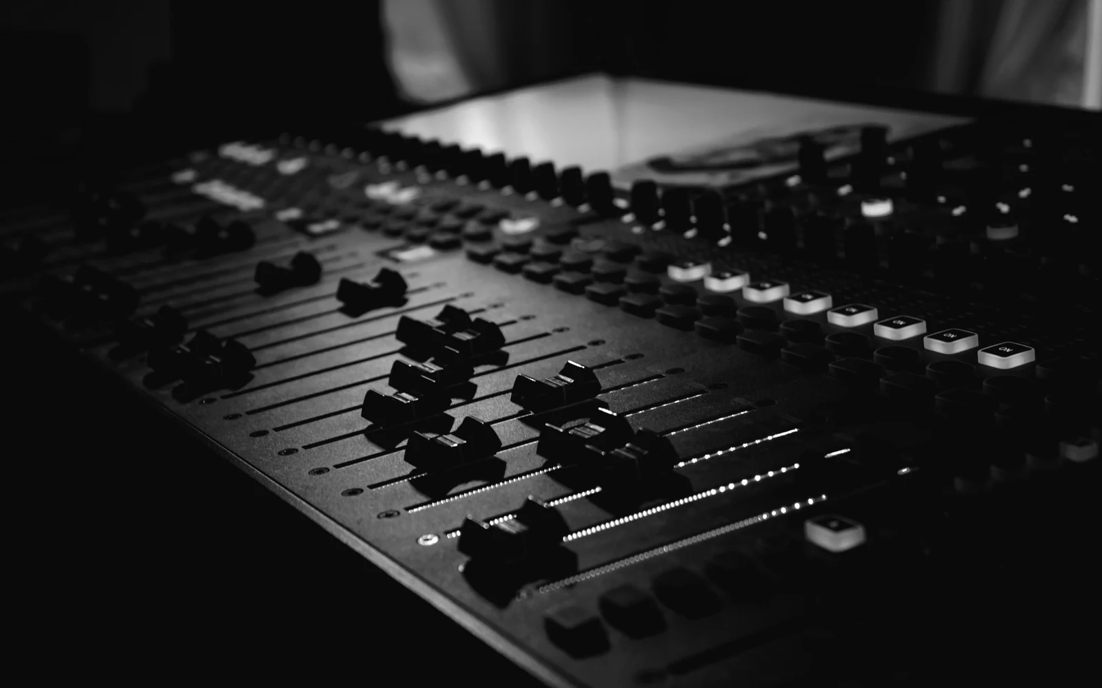 black and green audio mixer. Photograph accompanying Velaharra’s cultural event production Austin guide.